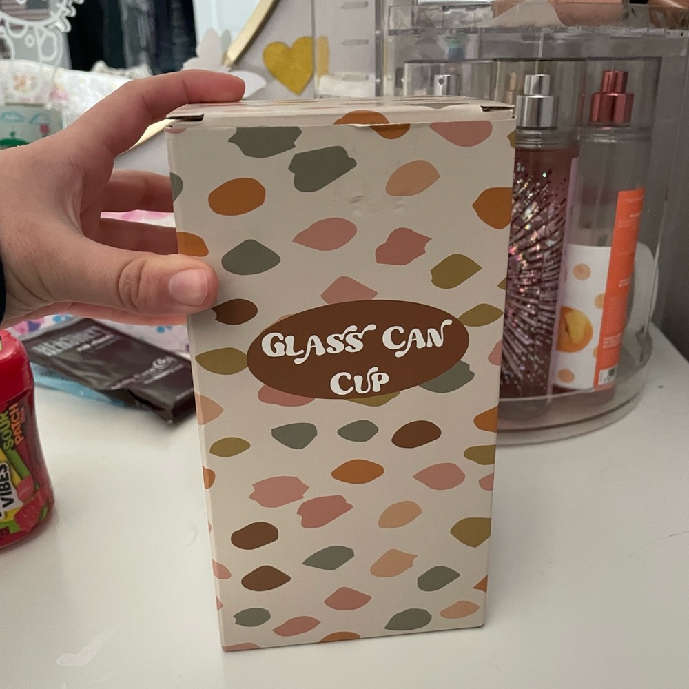 Glass cup with a Y on it